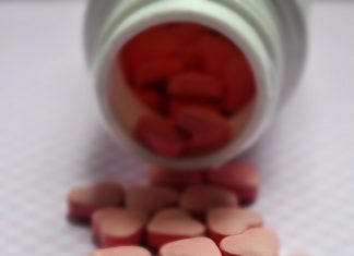 Selective focus photo of pink tablets